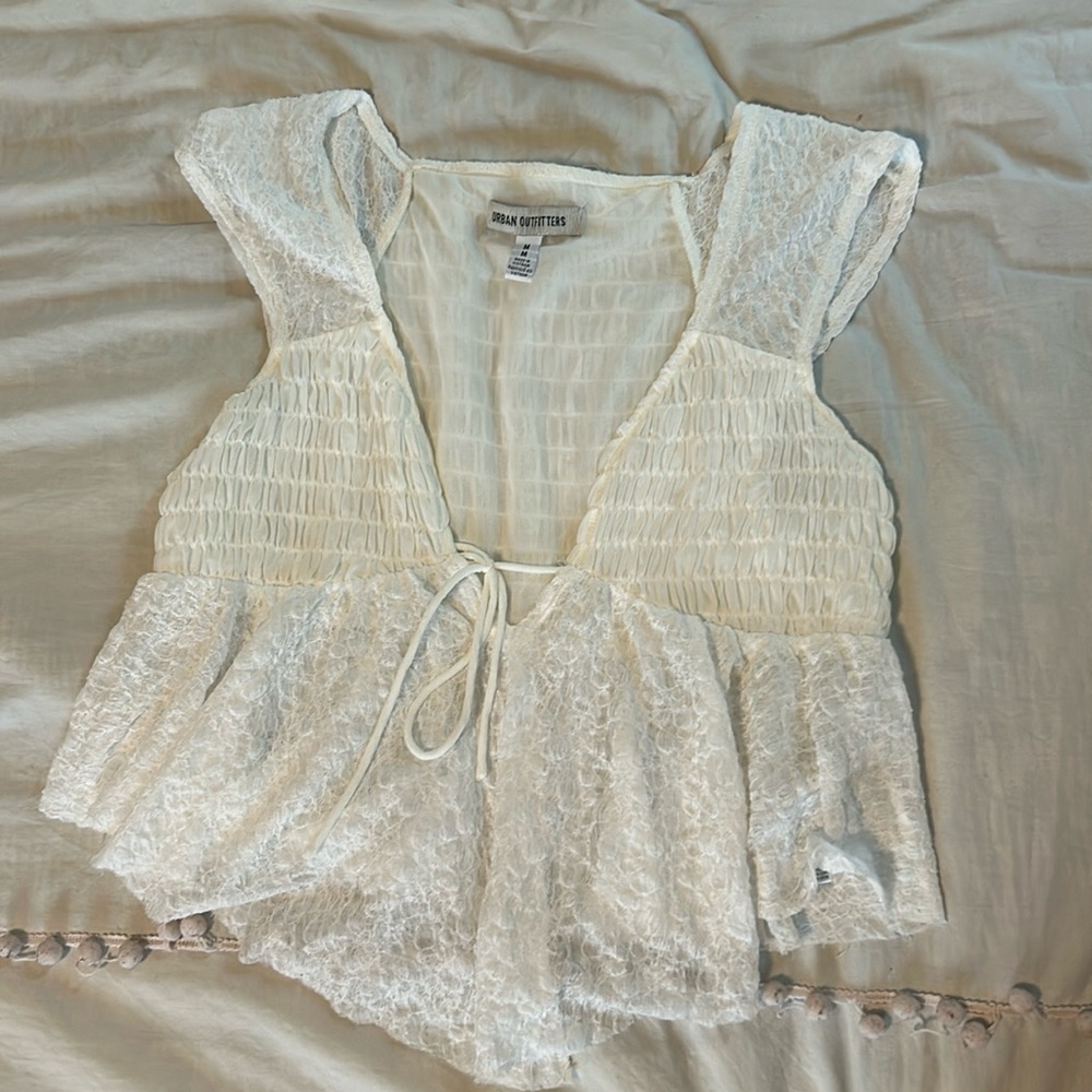 Cream Urban Outfitters blouse/top. Size Medium. Color cream.